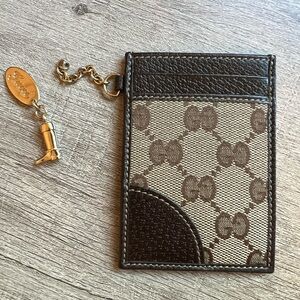 Gucci card holder with boot charm